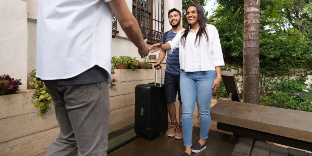Millennial travellers arriving at a hotel